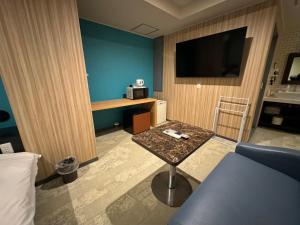 TV a/nebo společenská místnost v ubytování Hotel RIO新宿