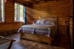 Postel nebo postele na pokoji v ubytování Tierra Cielo y SoLuna - Cabaña Serrana