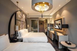 Katil atau katil-katil dalam bilik di Crystal Hotel Shanghai Lujiazui Oriental Pearl Tower