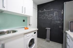 A kitchen or kitchenette at Granada Home Centro