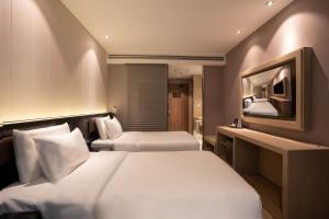 Katil atau katil-katil dalam bilik di Crystal Hotel Shanghai Lujiazui Oriental Pearl Tower