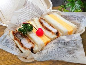 a group of sandwiches in a bag on a table at Coruscant Hotel NagasakiekiⅢ in Nagasaki