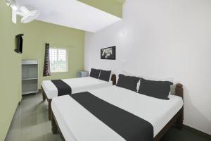 Φωτογραφία από το άλμπουμ του Hotel O ISIRI Rooms σε Mysore