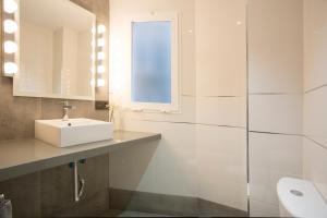 A bathroom at Granada Home Centro