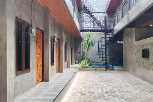 Fotografie z fotogalerie ubytování Urbanview Hotel Keys Home Syariah Banjarmasin v destinaci Terantang