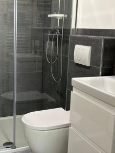Koupelna v ubytování Gemütliches Apartment + 5 fotografií