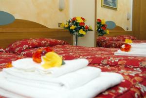 Postel nebo postele na pokoji v ubytování Hotel Chopin