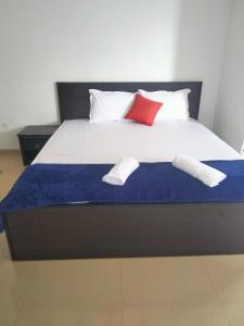 Postel nebo postele na pokoji v ubytování Thenu Homestay
