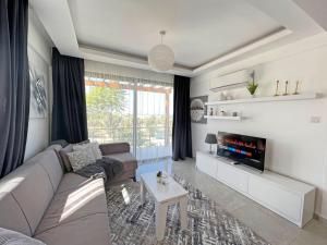 Χώρος καθιστικού στο Sky Breeze Villas +26 φωτογραφίες