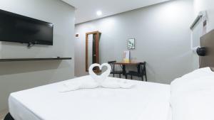 Postel nebo postele na pokoji v ubytování Sunny Day Residences Antipolo