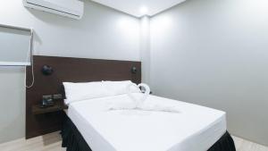 Postel nebo postele na pokoji v ubytování Sunny Day Residences Antipolo