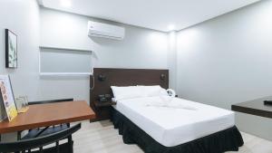 Postel nebo postele na pokoji v ubytování Sunny Day Residences Antipolo