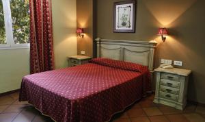 A bed or beds in a room at Los Bronces