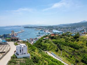 a view of a city and a body of water at Donghae Elmar in Donghae