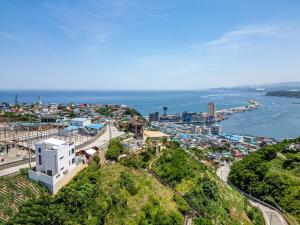 an aerial view of a city and the ocean at Donghae Elmar in Donghae