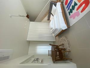 a small kitchen with a sink and a staircase at Mijeok Gonggam and Soso Gonggam Dokchae Pool Villa in Yeongam