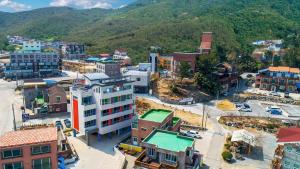 an aerial view of a city with mountains in the background at Samcheok Jangho Good Morning Pension in Yonghwa