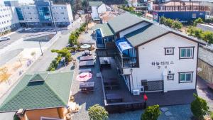 an overhead view of a house with a street at Geoje Sky Terrace Pension in P'allangp'o +4 photos