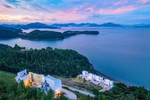 an aerial view of a large body of water at Yeosu Moine Pool Villa in Yeosu +9 photos
