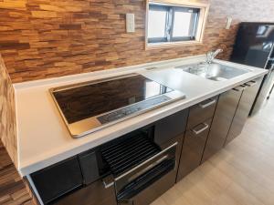 Kuchyň nebo kuchyňský kout v ubytování Myoko Onsen cottage Ajisai