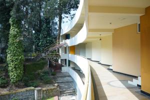 Balkón nebo terasa v ubytování DNC Shevaroys Resorts & Spa