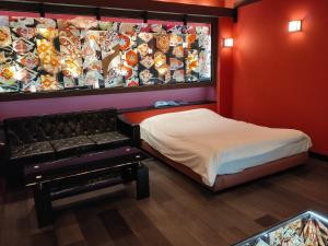 Postel nebo postele na pokoji v ubytování アネックス艶 -大人専用-