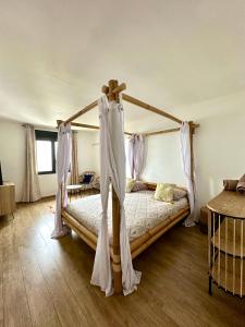 Postel nebo postele na pokoji v ubytování La VILLA MAHOT