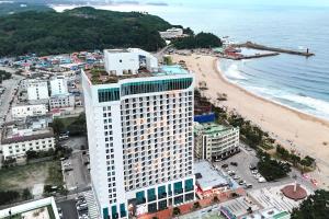 an aerial view of a hotel and the beach at Urbanstay Naksan Beach in Yangyang