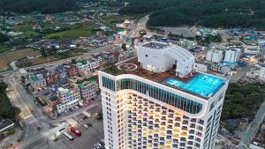 an overhead view of a building with a pool on top at Urbanstay Naksan Beach in Yangyang