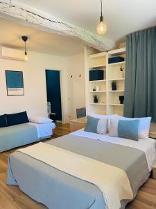 Postel nebo postele na pokoji v ubytování Modern Loft Rho Fiera Milano