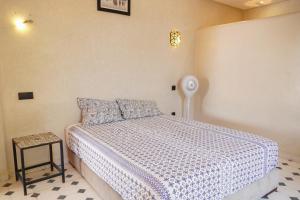 Ένα ή περισσότερα κρεβάτια σε δωμάτιο στο Villa Sira - Marrakech +17 φωτογραφίες