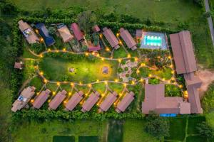 an overhead view of a house with lights at Sterling Orient Woods Pench in Silāri