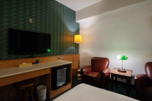 TV a/nebo společenská místnost v ubytování 天津大酒店 Vagus Hotel