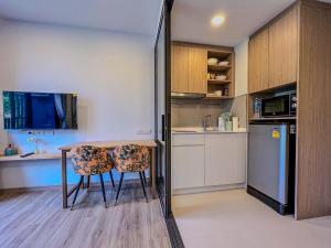 Η κουζίνα ή μικρή κουζίνα στο Skypark private new apartmant
