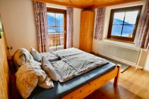 A bed or beds in a room at Hochleiten-Gut