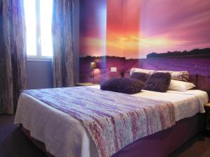 Postel nebo postele na pokoji v ubytování Logis Hôtel Le Glacier