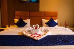 Voodi või voodid majutusasutuse Ananthyam Resort by Anukulas toas