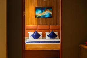 Voodi või voodid majutusasutuse Ananthyam Resort by Anukulas toas