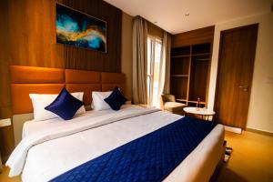 Voodi või voodid majutusasutuse Ananthyam Resort by Anukulas toas