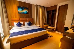 Voodi või voodid majutusasutuse Ananthyam Resort by Anukulas toas