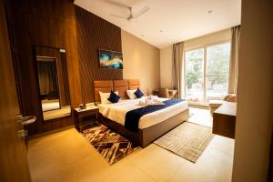 Voodi või voodid majutusasutuse Ananthyam Resort by Anukulas toas