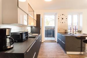 Η κουζίνα ή μικρή κουζίνα στο Ferienwohnung Kolow