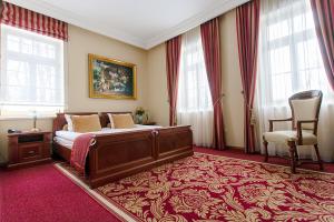 Łóżko lub łóżka w pokoju w obiekcie Pałac Żelechów Spa & Wellness