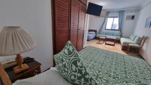 Postel nebo postele na pokoji v ubytování Hotel Zelis