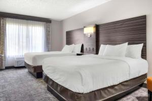 Postel nebo postele na pokoji v ubytování Hells Canyon Grand Hotel, Ascend Hotel Collection