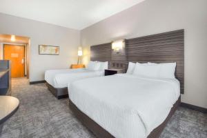 Postel nebo postele na pokoji v ubytování Hells Canyon Grand Hotel, Ascend Hotel Collection