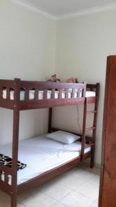 Postel nebo postele na pokoji v ubytování Crown Guest House