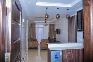 a room with a living room and a living room at Highland Rhinor in Eldoret