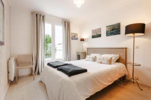 Postel nebo postele na pokoji v ubytování Maison 3 étoiles près centre-plages