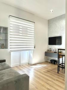 Телевизор и/или развлекательный центр в Maddalena Means Home